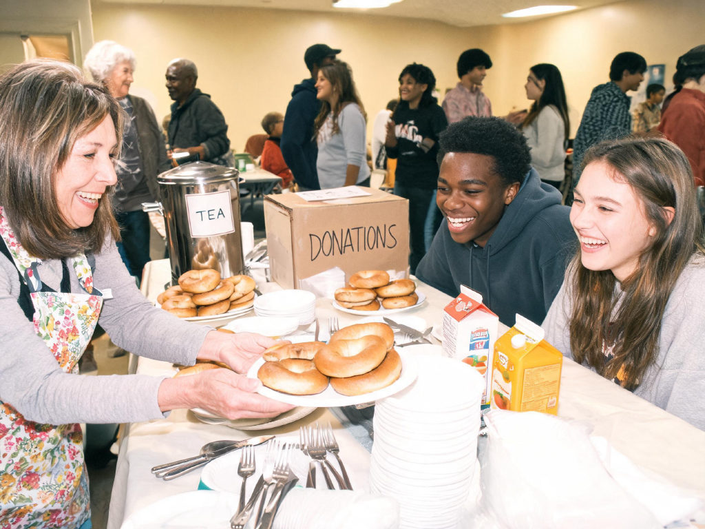 Community members coming together at a local event
